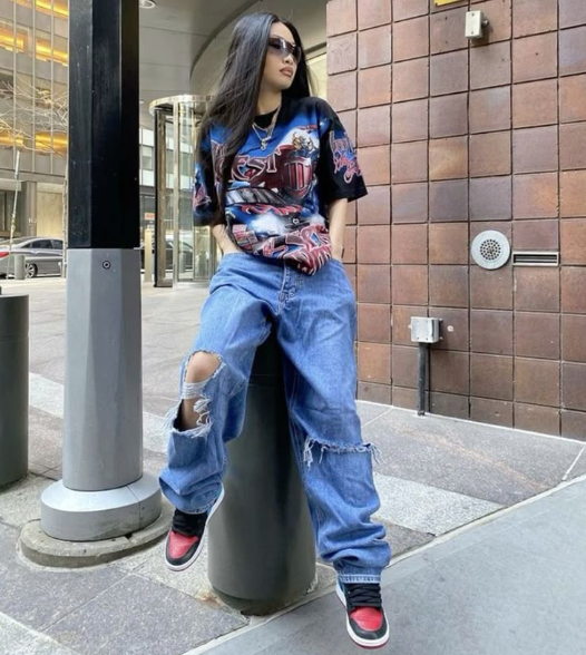 Graphic tee with ripped jeans Graphic tee with ripped jeans