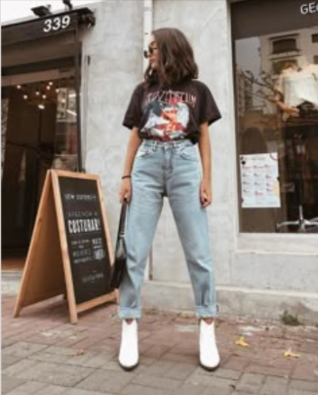 graphic tee with ripped jeans and sneakers graphic tee with ripped jeans and sneakers