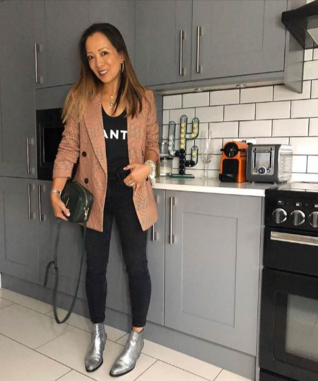 tailored blazer with a chic blouse and straight-leg jeans tailored blazer with a chic blouse and straight-leg jeans
