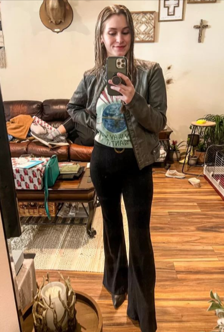 well-fitted jeans and a chic top with jacket well-fitted jeans and a chic top with jacket
